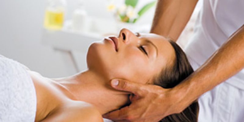 Woman receiving a neck massage